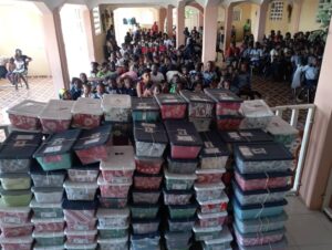 Haitian children gather to receive their Christmas joy boxes