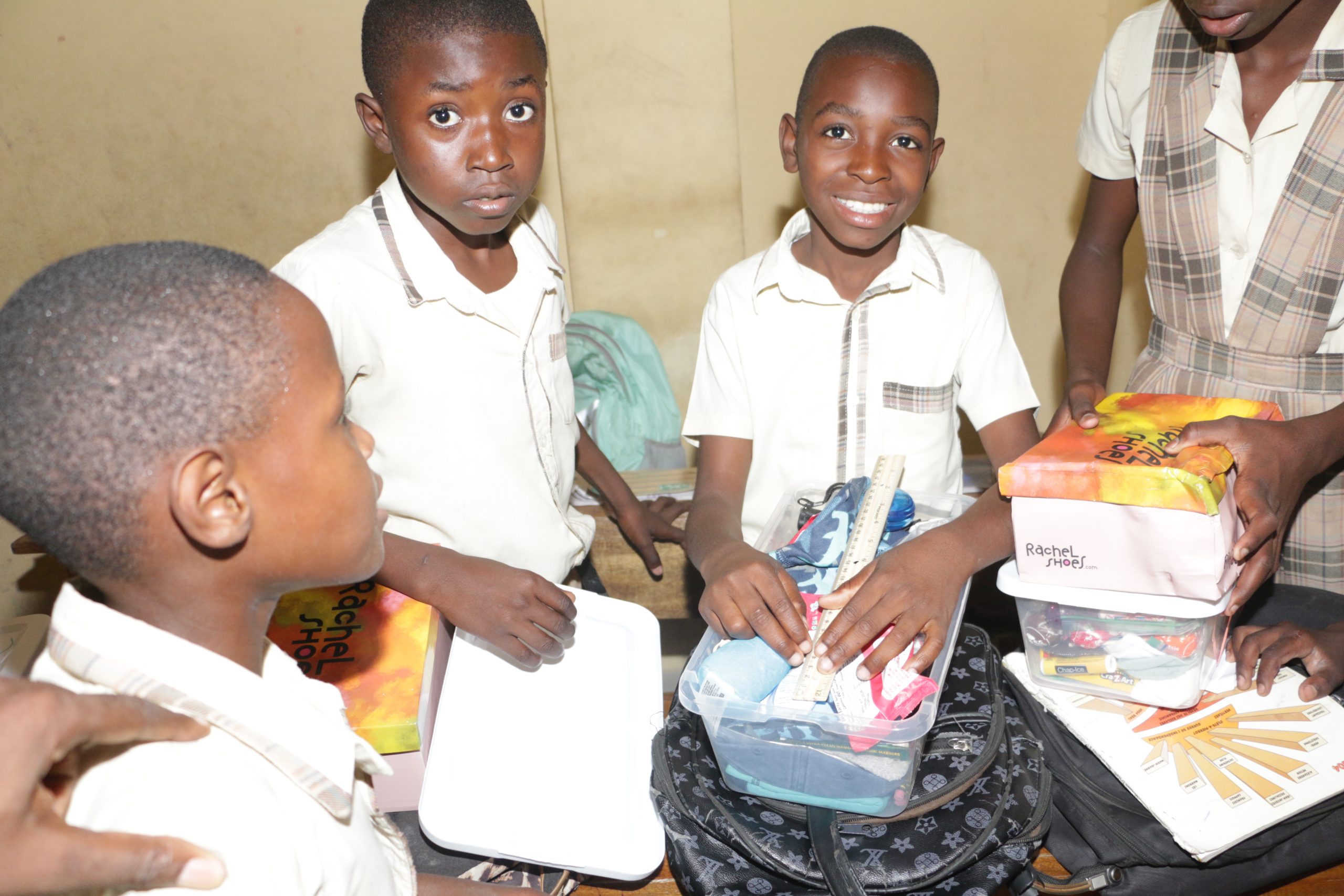 Haitian boy excited to receive his joy box.