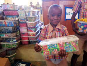 Haitian child receives Christmas Joy Box