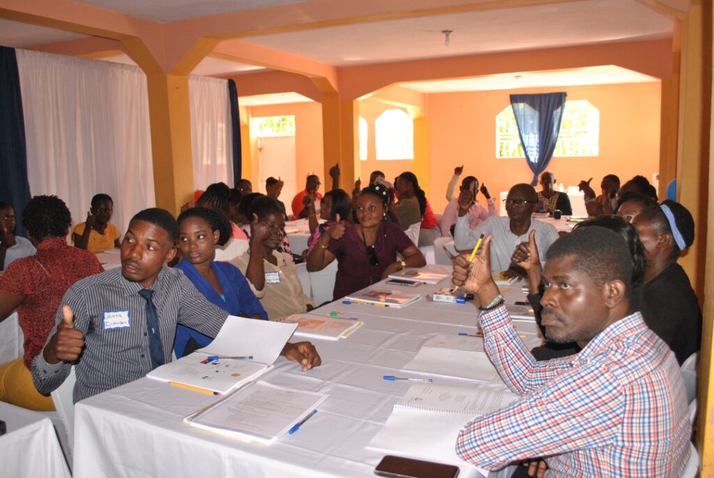 Haitian teachers participating virtually in a professional development session with P4H Global.