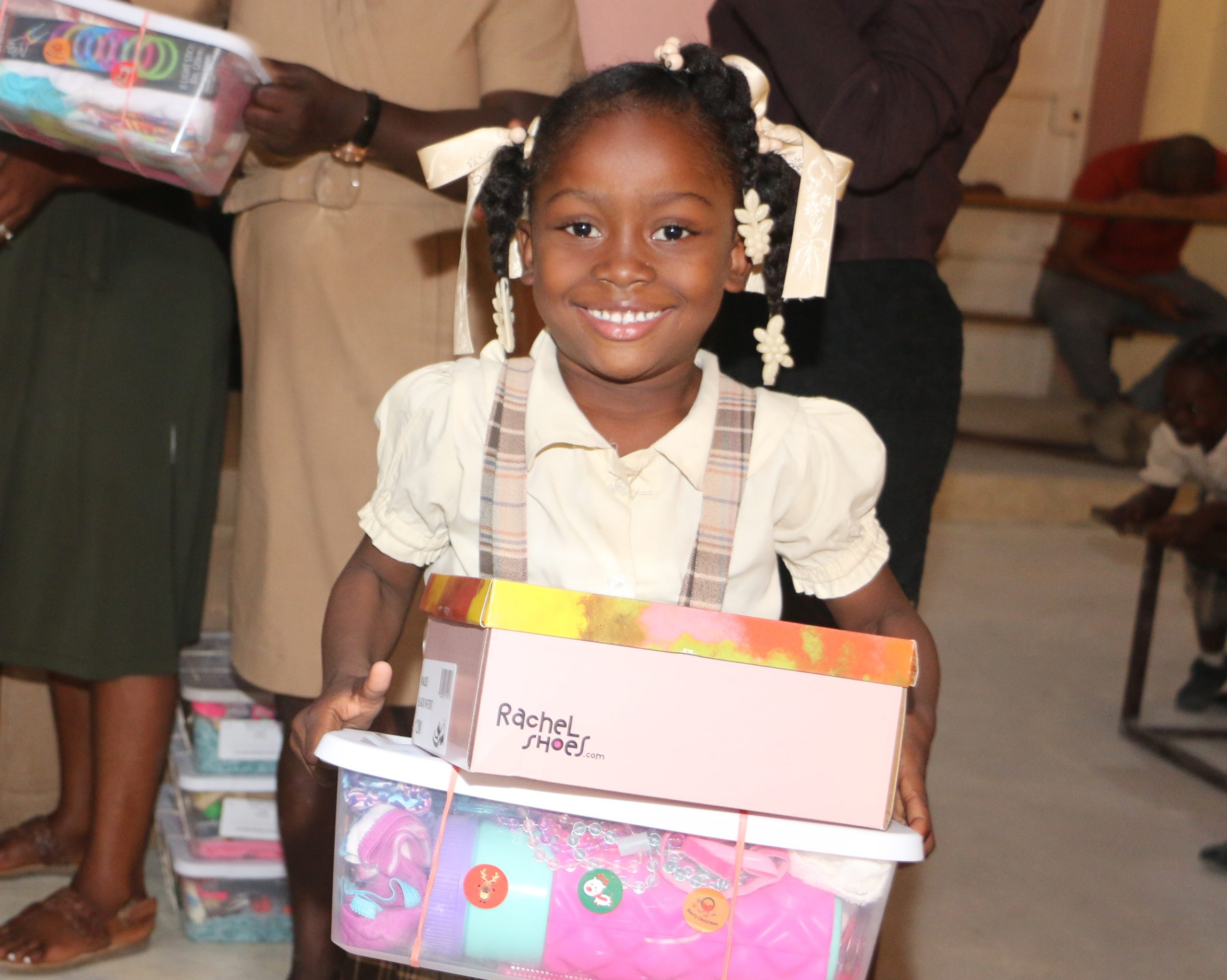 Young Haitian girl receives a joy box