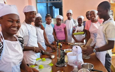 Hope for Haiti's Chlidren students learning culinary skills.